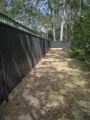 GramLine sawtooth steel fence in Coke colour