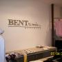 Hand painted sign on interior of menswear shop
