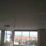 Ceilings fixed to metal batons and suspended fram