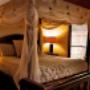 Relax in our four poster king size bed