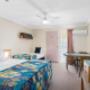 Guest room with three beds