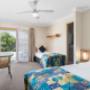 Guest room with three beds