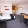 Guest room with table and chairs