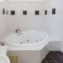 Guest room with whirlpool bathtub
