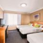 Guest room with three beds