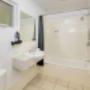 Bathroom with shower over Bathtub