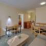 Guest room with three beds