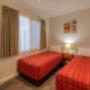 Guest room with three beds