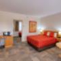 Guest room with three beds