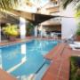 Outdoor pool in garden setting