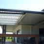 Shadeblade with flat roof over deck