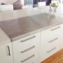 Custom designed/ made bench top with stainless steel cutting / heat resistant board
