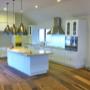 Kitchen renovation in Mornington. Crisp white, natural timbers and stone bench tops.