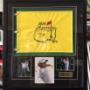 Uploaded by visitor on 29/11/2015 - Adam Scott signed Flag and photo.