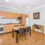 Guest room with microwave and refrigerator