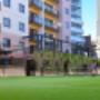 Tennis court at Nesuto Mounts Bay Apartment Hotel