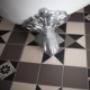 Uploaded by visitor on 28/7/2017 - A clawfoot bathtub atop a beautiful Olde English Tiles™ tessellated tile floor