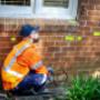 Man fixing sunken Foundation