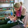 Dr Bec Farthing providing shockwave treatment