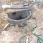 Core drilling hole in soakwell for drainage