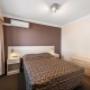 Guest room with three beds