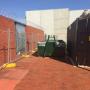 A skip bin on a newly bricked up floor