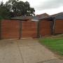 Automated Timber Swing Gate - Haven Fencing