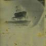 Old damaged negative - an only photo of a baby