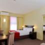 Guest room with three beds