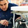 Aqua Maintain's plumbing technician in action