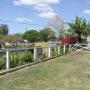 Lawn and garden areas around cabins