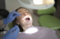 Choosing Between Single Tooth Replacement and Full Smile Restoration in Sydney