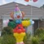 Uploaded by visitor on 13/5/2016 - Balloon Clown holding a bunch of balloons