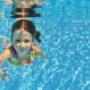 Child Underwater in Pool