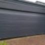 Sectional garage door installed by Araccess