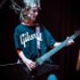 One of our Performance Program students showing what she's learned on guitar.