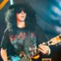 One of our students performs as Slash at our Guns n Roses performance.