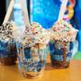 Three ice cream sundaes in the Ben & Jerry's ice cream shop.