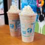 Two ice cream shakes in the Ben & Jerry's ice cream shop.