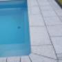 Uploaded by visitor on 16/2/2018 - Light Grey Granite tiles, pavers and coping.