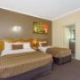 Guest room with three beds