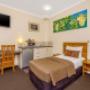 Guest room with three beds