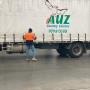 Auz Country Worker Adjusting the Freight Load