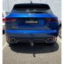Blue Haval Jolion rear with fitted towbar and “#TOWBARJOE” plate; Midland Towbars sign in background.