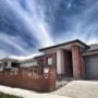 Red brick fence in Wildflower Drive, Sunbury a few days after completion.