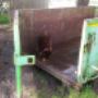 Charlii Girl inspects the bin for cleanliness before the next customer.