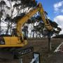 Drilling into solid rock for safety barriers as part of the Geelong-Bacchus Marsh Rd upgrade