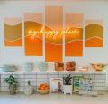 My Happy Place orange light sign styled on a feature wall - by Custom Neon® My Happy Place