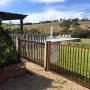 Rustic pool fencing