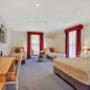 Guest room with three beds